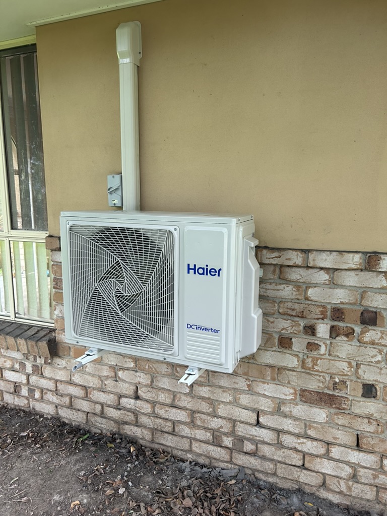 Haier outdoor unit installed by Home Comfort Air in Oxenford